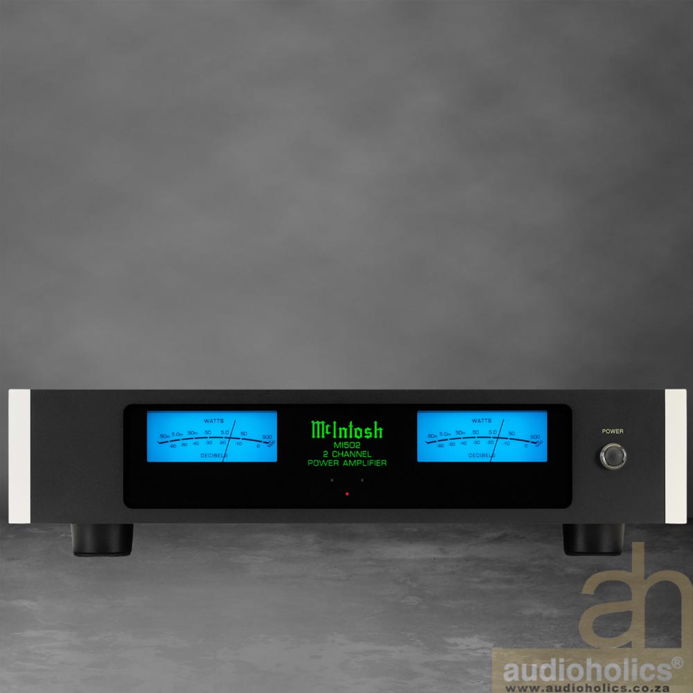 McIntosh-MI502-Main - Audioholics South Africa McIntosh two-channel power amplifier with blue illuminated VU meters on the front panel and a power switch on the right edge.