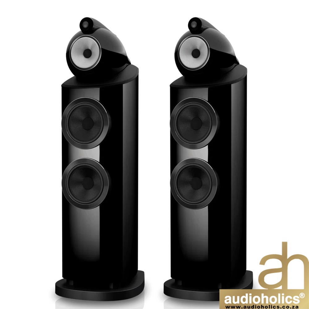 Pair of black floor-standing speakers with two drivers and a tweeter, shown side by side; Audioholics watermark in the corner.