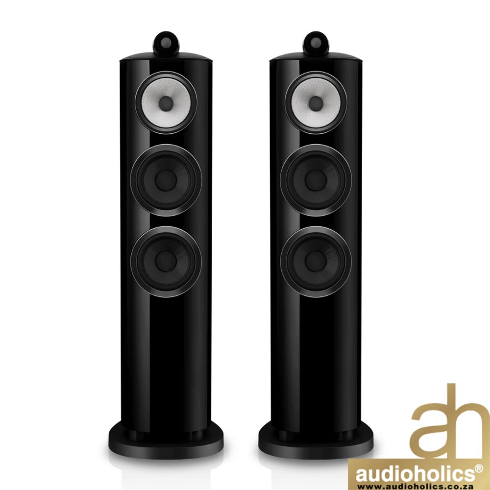BW-804-D5-Galleryjpg-2 - Audioholics South Africa Pair of black floor-standing speakers with three drivers each and a glossy finish, shown with the Audioholics logo in the corner.