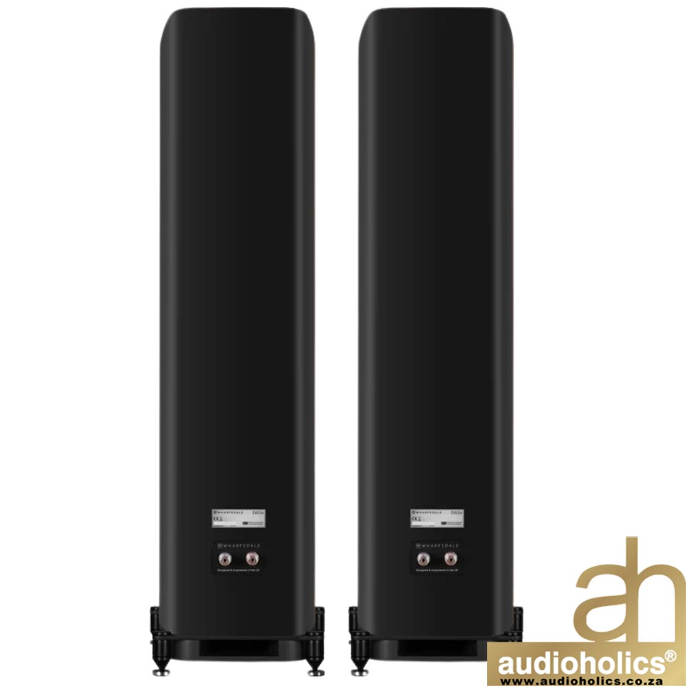 Pair of tall black floor-standing speakers with rounded edges and adjustable feet, shown with Audioholics logo in the bottom-right corner.