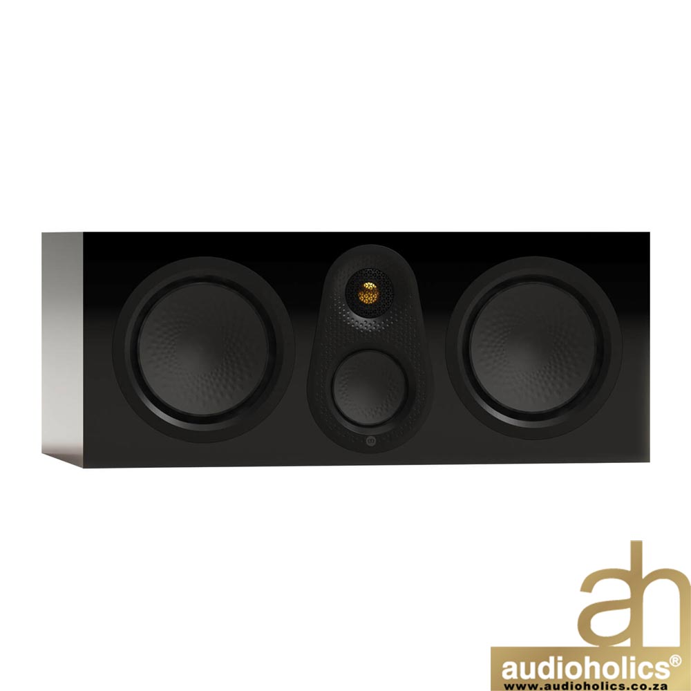 Black home theater speaker setup with two large side woofers and a central midrange/tweeter unit; Audioholics logo bottom-right.