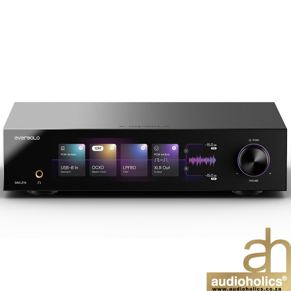 Front view of a black DAC audio amplifier with a colorful touch-display panels across the front and a large illuminated volume knob on the right; audioholics watermark bottom right