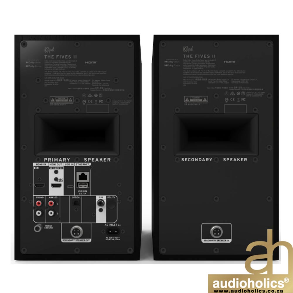 Klipsch-The-Fives-II-Main--Ebonyjpg-4 - Audioholics South Africa Pair of black rear-view speakers showing back panel with input ports and labels; Audioholics watermark appears in bottom-right corner.