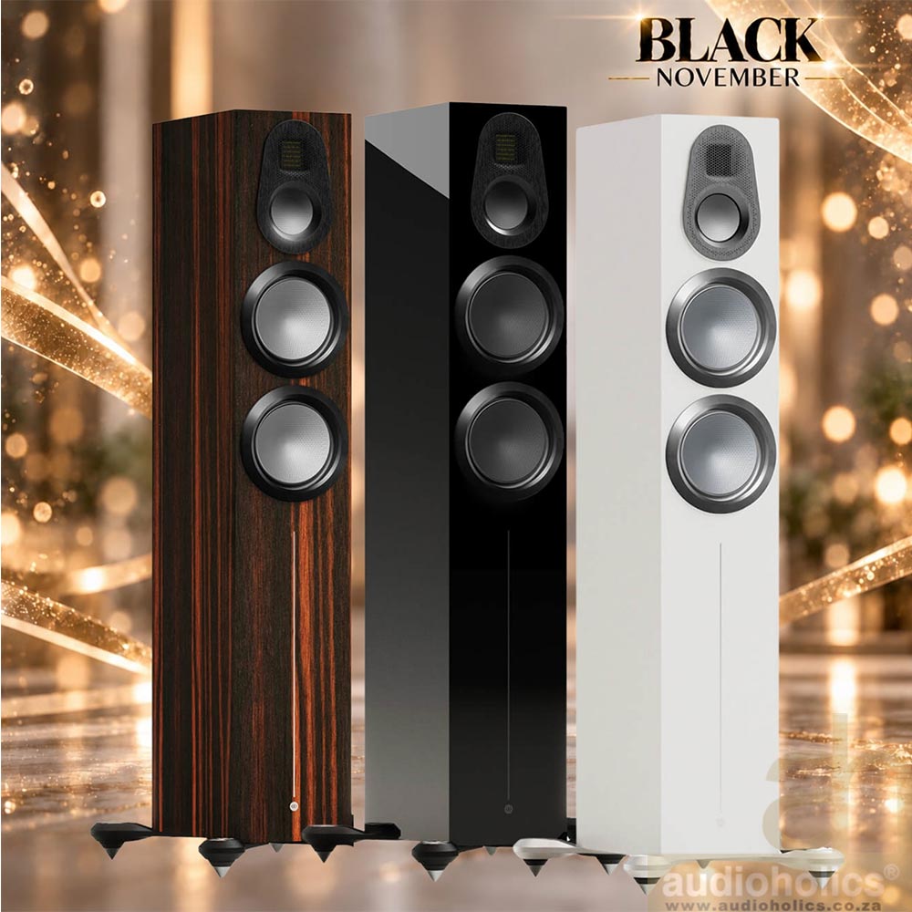 Monitor-Audio-Gold-300-Main - Audioholics South Africa Three floorstanding speakers in wood, black, and white finishes showcased for a Black November promo banner at a glamorous setting.