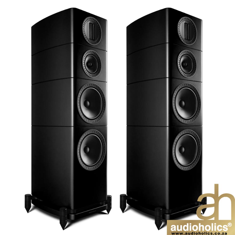 Pair of black floor-standing speakers with multiple drivers on sturdy stands, against a white background (Audioholics watermark).
